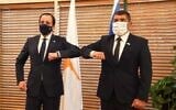 Foreign Minister Gabi Ashkenazi (R) meets visiting Cypriot counterpart Nikos Christodoulides in Jerusalem, February 14, 2021. (Foreign Ministry)