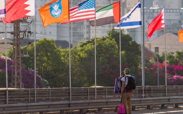 The flags of the US, United Arab Emirates, Israel and Bahrain seen on the side of a road in the city of Netanya, September 14, 2020 (Flash90)