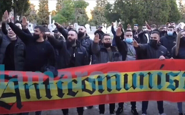 Neo-Nazis giving the Hitler salute at an event near a cemetery in Madrid, Spain on Feb. 13, 2021 (Lamarea.com via JTA) Neo-Nazis giving the Hitler salute at an event near a cemetery in Madrid, Spain on Feb. 13, 2021 (Lamarea.com via JTA)