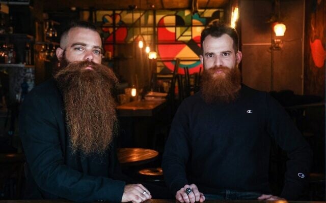 Bar Pinto (R) and Gilad Levi, two red-bearded 29-year-olds and founders of 'Beard for All' ('Ptor Zakan' in Hebrew), a campaign challenging Israeli military rules compelling all male troops to be cleanshaven, in Tel Aviv on February 7, 2021 (Emmanuel DUNAND / AFP) Bar Pinto (R) and Gilad Levi, two red-bearded 29-year-olds and founders of 'Beard for All' ('Ptor Zakan' in Hebrew), a campaign challenging Israeli military rules compelling all male troops to be cleanshaven, in Tel Aviv on February 7, 2021 (Emmanuel DUNAND / AFP)