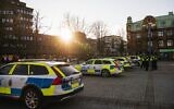 Illustrative: Police cars are parked at a main square in the Swedish city of Vetlanda on March 4, 2021, one day after a stabbing attack. (Jonathan NACKSTRAND / AFP)