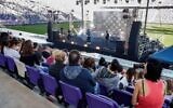People vaccinated against COVID-19 coronavirus disease and holding a "green pass" (proof of being fully vaccinated) attend a "green pass concert" organised by the Tel Aviv municipality at Bloomfield Stadium in the Israeli Mediterranean coastal city on March 5, 2021. (Photo by JACK GUEZ / AFP)