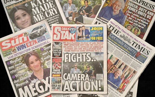 An arrangement of UK daily newspapers photographed as an illustration in Brighton on March 8, 2021, shows front page headlines reporting on the story of the interview given by Meghan, Duchess of Sussex, wife of Britain's Prince Harry, Duke of Sussex, to Oprah Winfrey, which aired on US broadcaster CBS (Glyn KIRK / AFP) An arrangement of UK daily newspapers photographed as an illustration in Brighton on March 8, 2021, shows front page headlines reporting on the story of the interview given by Meghan, Duchess of Sussex, wife of Britain's Prince Harry, Duke of Sussex, to Oprah Winfrey, which aired on US broadcaster CBS (Glyn KIRK / AFP)