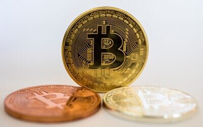 A visual representation of Bitcoin, at the 'Bitcoin Change' shop in Tel Aviv, February 6, 2018. (Jack Guez/AFP)