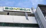 A photo taken on March 27, 2021 shows the logo on the facade of the new manufacturing site of German company BioNTech for the production of the vaccine against the coronavirus (COVID-19) in Marburg, central Germany. (Thomas Lohnes / AFP)