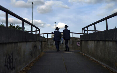 Two Jewish men make their way home from the Synagogue on the first day of Rosh Hashanah on September 18, 2020 in Gateshead, United Kingdom. (Christopher Furlong/Getty Images/via JTA)