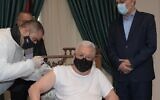 Palestinian Authority President Mahmoud Abbas receives his first shot of COVID-19 vaccine, March 20, 2021. (Screenshot/WAFA)