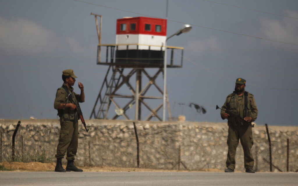 Palestinian Hamas guards stand near an Egyptian watchtower on the border with Egypt in Rafah, southern Gaza Strip. (AP/Hatem Moussa) Palestinian Hamas guards stand near an Egyptian watchtower on the border with Egypt in Rafah, southern Gaza Strip. (AP/Hatem Moussa)