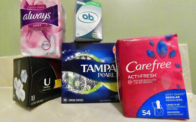 Illustrative image: Various menstrual products are seen, Wednesday, February 20, 2019, in Kennesaw, Georgia. Georgia’s legislature is joining a nationwide effort to provide menstrual products for public school students in need. (AP Photo/Mike Stewart)