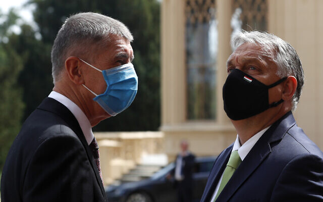 Prime Minister of the Czech Republic Andrej Babis, left, welcomes his Hungarian counterpart Viktor Orban for the V4 summit at the Lednice Chateau in Lednice, Czech Republic, June 11, 2020. (AP Photo/ Petr David Josek) Prime Minister of the Czech Republic Andrej Babis, left, welcomes his Hungarian counterpart Viktor Orban for the V4 summit at the Lednice Chateau in Lednice, Czech Republic, June 11, 2020. (AP Photo/ Petr David Josek)