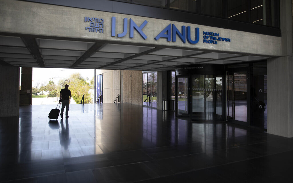 Visitors tour the Museum of the Jewish People in Tel Aviv on March 9, 2021. (AP Photo/Sebastian Scheiner)