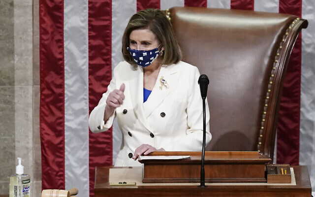 House Speaker Nancy Pelosi leads the vote to approve a landmark $1.9 trillion COVID-19 relief bill, at the Capitol in Washington, March 10, 2021. (AP Photo/J. Scott Applewhite) House Speaker Nancy Pelosi leads the vote to approve a landmark $1.9 trillion COVID-19 relief bill, at the Capitol in Washington, March 10, 2021. (AP Photo/J. Scott Applewhite)