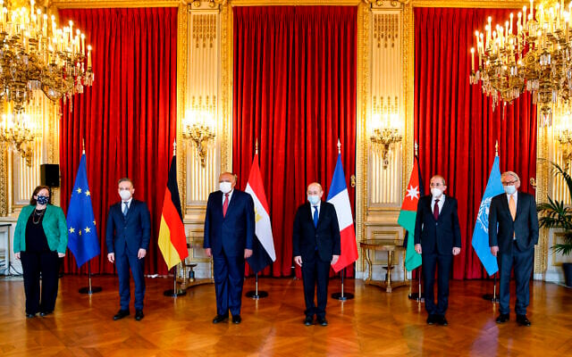 From left to right, EU Special Envoy for the Middle East Peace Process Susanna Terstal, German Foreign Minister Heiko Maas, Egyptian Foreign Minister Sameh Shoukry, French Foreign Affairs Minister Jean-Yves Le Drian, Jordanian Foreign Minister Ayman Safadi and UN special coordinator for the Middle East Tor Wennesland pose for a group photo prior to their meeting in Paris, March 11, 2021. (Ludovic Marin/Pool Photo via AP) From left to right, EU Special Envoy for the Middle East Peace Process Susanna Terstal, German Foreign Minister Heiko Maas, Egyptian Foreign Minister Sameh Shoukry, French Foreign Affairs Minister Jean-Yves Le Drian, Jordanian Foreign Minister Ayman Safadi and UN special coordinator for the Middle East Tor Wennesland pose for a group photo prior to their meeting in Paris, March 11, 2021. (Ludovic Marin/Pool Photo via AP)