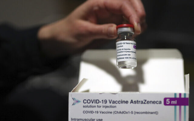 A medical staff member displays the AstraZeneca COVID-19 vaccine at a vaccination site set up in the Marseille soccer Velodrome stadium, during a presentation to the media, in Marseille, March 15, 2021. (AP/Daniel Cole) A medical staff member displays the AstraZeneca COVID-19 vaccine at a vaccination site set up in the Marseille soccer Velodrome stadium, during a presentation to the media, in Marseille, March 15, 2021. (AP/Daniel Cole)