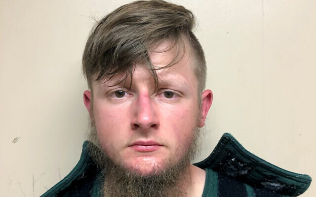 This booking photo provided by the Crisp County Sheriff's Office shows Robert Aaron Long on Tuesday, March 16, 2021. Long was arrested as a suspect in the fatal shootings of multiple people at three Atlanta-area massage parlors, most of them women of Asian descent, authorities said. (Crisp County Sheriff's Office via AP) This booking photo provided by the Crisp County Sheriff's Office shows Robert Aaron Long on Tuesday, March 16, 2021. Long was arrested as a suspect in the fatal shootings of multiple people at three Atlanta-area massage parlors, most of them women of Asian descent, authorities said. (Crisp County Sheriff's Office via AP)