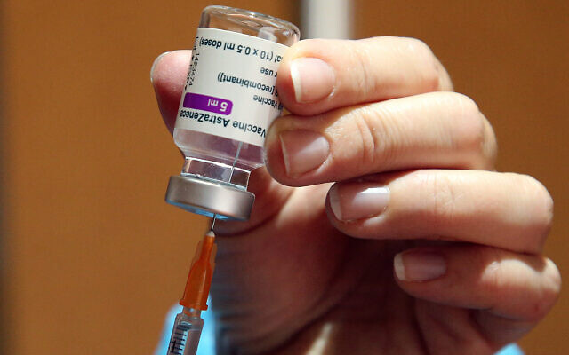 A Red Cross volunteer prepares the AstraZeneca COVID-19 vaccine in a vaccination center of Saint-Jean-de-Luz, southwestern France, March 19, 2021. (AP Photo/Bob Edme) A Red Cross volunteer prepares the AstraZeneca COVID-19 vaccine in a vaccination center of Saint-Jean-de-Luz, southwestern France, March 19, 2021. (AP Photo/Bob Edme)
