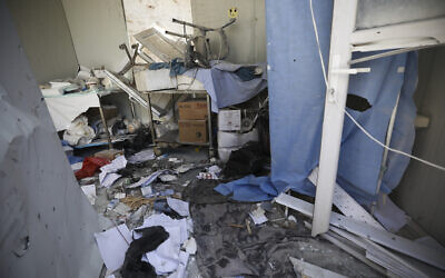 Damage from shelling is seen in hospital in Atareb, a town in rural western Aleppo, Syria, March 22, 2021. (AP Photo/ Ghaith Alsayed)