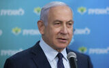 Prime Minister Benjamin Netanyahu visits the Leumit Health Care Services vaccination facility in Jerusalem, February 16, 2021. (Alex Kolomoisky/Pool via AP, File)