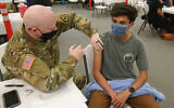 Illustrative: Logan Garnica receives his Pfizer vaccine on March 25, 2021, in Spanish Fork, Utah. (AP Photo/Rick Bowmer)