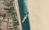 FILE - In this March 28, 2021, satellite file image from Planet Labs Inc, the cargo ship MV Ever Given sits stuck in the Suez Canal near Suez, Egypt. (Planet Labs Inc. via AP)