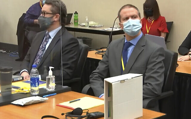 In this image from video, defense attorney Eric Nelson, left, and former Minneapolis police officer Derek Chauvin listen as Hennepin County Judge Peter Cahill presides over pre-trial motions prior to opening statements, March 29, 2021, in the trial of Chauvin in the May 25, 2020, death of George Floyd at the Hennepin County Courthouse in Minneapolis, Minnessota. (Court TV via AP, Pool) In this image from video, defense attorney Eric Nelson, left, and former Minneapolis police officer Derek Chauvin listen as Hennepin County Judge Peter Cahill presides over pre-trial motions prior to opening statements, March 29, 2021, in the trial of Chauvin in the May 25, 2020, death of George Floyd at the Hennepin County Courthouse in Minneapolis, Minnessota. (Court TV via AP, Pool)