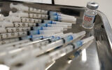 Syringes filled with the Moderna COVID-19 vaccine at a pop up site in the Queens borough of New York, March 18, 2021. (AP Photo/Mary Altaffer)