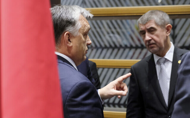 Hungarian Prime Minister Viktor Orban, left, speaks with Czech Republic's Prime Minister Andrej Babis during a meeting of the Visegrad Group on the sidelines of an EU summit in Brussels on Dec. 14, 2017. (Olivier Hoslet, Pool Photo via AP) Hungarian Prime Minister Viktor Orban, left, speaks with Czech Republic's Prime Minister Andrej Babis during a meeting of the Visegrad Group on the sidelines of an EU summit in Brussels on Dec. 14, 2017. (Olivier Hoslet, Pool Photo via AP)