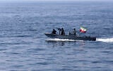 Illustrative -- In this photo released Feb. 17, 2021, by the Iranian army, an Iranian naval vessel flying an Iranian flag participates in a joint naval exercise of the Russian navy, the Iranian navy and the Iranian Revolutionary Guard's navy in the Indian Ocean. (Iranian Army via AP)