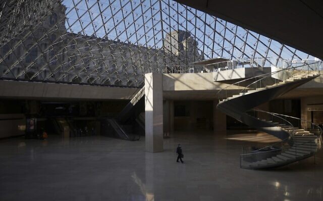 A man walks through the deserted Louvre museum, in Paris, Thursday, Feb. 11, 2021 (AP Photo/Thibault Camus) A man walks through the deserted Louvre museum, in Paris, Thursday, Feb. 11, 2021 (AP Photo/Thibault Camus)