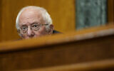 Senate Budget Committee Chairman Sen. Bernie Sanders, I-Vt., listens during a hearing on Capitol Hill in Washington on February 25, 2021, examining wages at large profitable corporations. (AP Photo/Susan Walsh, Pool)