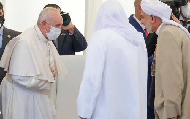 Pope Francis , left, arrives at an interreligious meeting near the archaeological area of the Sumerian city-state of Ur, 20 kilometers south-west of Nasiriyah, Iraq, Saturday, March 6, 2021 (AP Photo/Andrew Medichini)