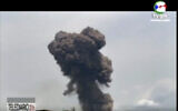 This TVGE image made from video shows smoke rising over the blast site at a military barracks in Bata, Equatorial Guinea, March 7, 2021. (TVGE via AP)