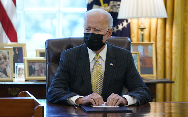US President Joe Biden in the Oval Office of the White House, in Washington, March 30, 2021. (Evan Vucci/AP) US President Joe Biden in the Oval Office of the White House, in Washington, March 30, 2021. (Evan Vucci/AP)