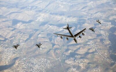 Israeli F-15 fighter jets escort an American B-52 bomber through Israeli airspace on March 7, 2021. (Israel Defense Forces)