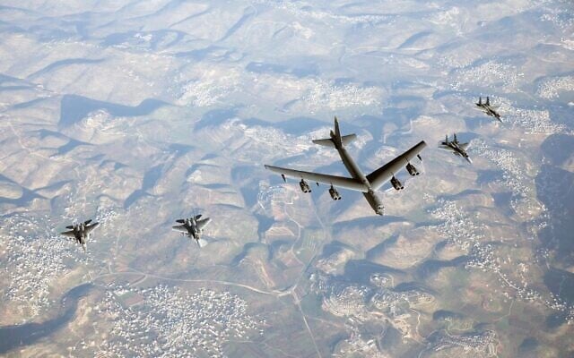 Israeli F-15 fighter jets escort an American B-52 bomber through Israeli airspace on March 7, 2021. (Israel Defense Forces) Israeli F-15 fighter jets escort an American B-52 bomber through Israeli airspace on March 7, 2021. (Israel Defense Forces)