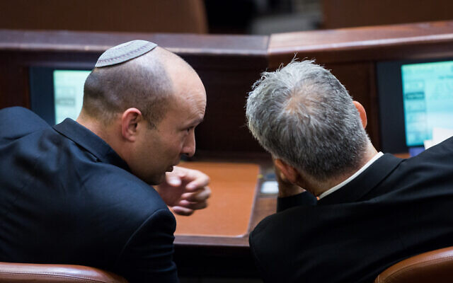 Then-education minister Naftali Bennett (L) with Yesh Atid leader Yair Lapid in the Knesset on September 2, 2015. (Yonatan Sindel/Flash90) Then-education minister Naftali Bennett (L) with Yesh Atid leader Yair Lapid in the Knesset on September 2, 2015. (Yonatan Sindel/Flash90)