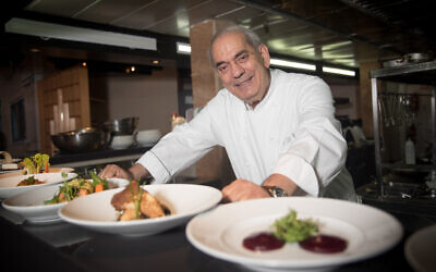 Top chef Shalom Kadosh poses for a picture in Jerusalem on May 27, 2018. (Yonatan Sindel/Flash90)
