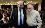 Rabbi Chaim Druckman, right and MK Naftali Bennett attend the campaign launch of the right-wing Yamina party, February 12, 2020. (Tomer Neuberg/FLASH90)