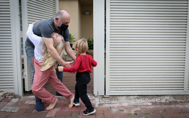 Grandparents meets with their grandchildren in their home in Ramat Gan, on February 05, 2021. ( Chen Leopold/Flash90) Grandparents meets with their grandchildren in their home in Ramat Gan, on February 05, 2021. ( Chen Leopold/Flash90)