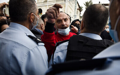 Israeli Arabs protest against violence, organised crime and recent killings among their communities, in the Arab town of Umm al-Fahm, February 5, 2021. (Roni Ofer/Flash90)