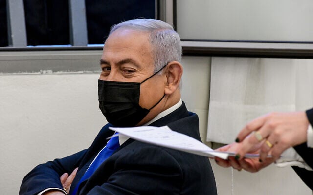 Prime Minister Benjamin Netanyahu at a court hearing at the District Court in Jerusalem on February 8, 2021. (Reuven Kastro/POOL) Prime Minister Benjamin Netanyahu at a court hearing at the District Court in Jerusalem on February 8, 2021. (Reuven Kastro/POOL)