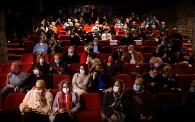 Theater-goers at the Khan theatre in Jerusalem on February 23, 2021.  (Yonatan Sindel/Flash90)