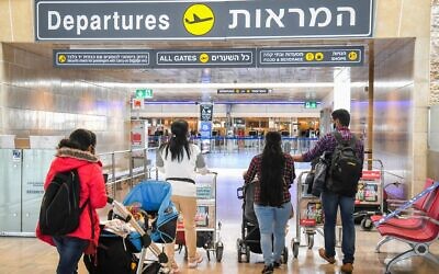 Passengers seen at Ben Gurion International Airport near Tel Aviv on March 8, 2021. (Flash90)