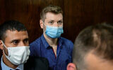 Yair Netanyahu, son of then-Prime Minister Benjamin Netanyahu, arrives for a court hearing at the Tel Aviv Magistrate's Court in Tel Aviv on March 10, 2021. (Avshalom Sassoni/Flash90)