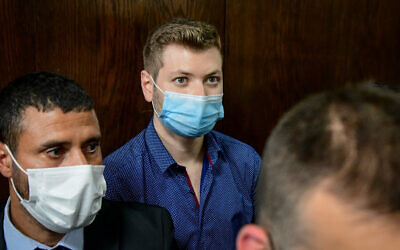 Yair Netanyahu, son of then-Prime Minister Benjamin Netanyahu, arrives for a court hearing at the Tel Aviv Magistrate's Court in Tel Aviv on March 10, 2021. (Avshalom Sassoni/Flash90)