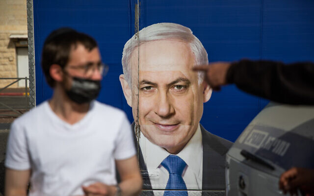 A campaign poster of Likud's Prime Minister Benjamin Netanyahu in Jerusalem, March 21, 2021. (Shir Torem/Flash90) A campaign poster of Likud's Prime Minister Benjamin Netanyahu in Jerusalem, March 21, 2021. (Shir Torem/Flash90)