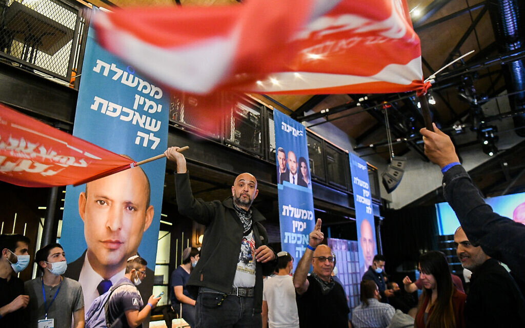 Yamina supporters at a party event in Petah Tikva on March 23, 2021. (Avi Dishi/Flash90)