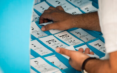 Voting slips for Knesset elections on March 23, 2021. (Avi Roccah/Flash90)