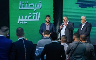 Ra'am party leader Mansour Abbas, center, at a post-election event in Tamra on March 23, 2021. (Flash90)