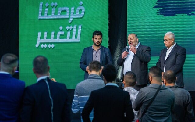 Ra'am party leader Mansour Abbas, center, at a post-election event in Tamra on March 23, 2021. (Flash90) Ra'am party leader Mansour Abbas, center, at a post-election event in Tamra on March 23, 2021. (Flash90)